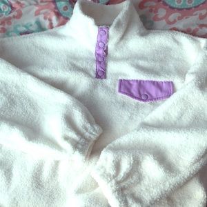 White with purple sweater